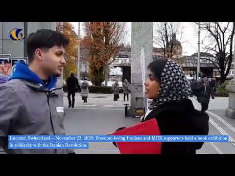 Lucerne, Switzerland—Nov 22, 2023: MEK supporters exhibition in support of the Iranian Revolution.