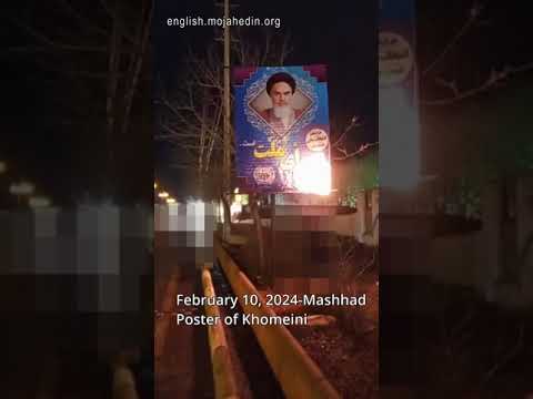 Iran protests: poster of Ruhollah Khomeini burning in Mashhad