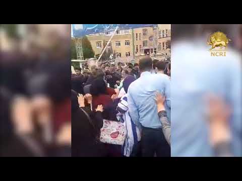 KARAJ, Iran. Security forces clash with protesting people in front of the governorate
