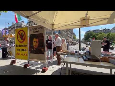 Paris, France—May 11, 2024: MEK Supporters Exhibition in Support of the Iranian Revolution.