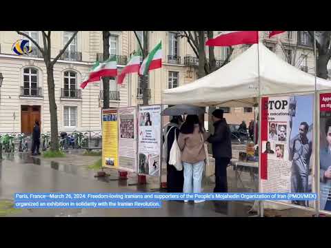 Paris—March 26, 2024: MEK supporters held an exhibition in solidarity with the Iranian Revolution.