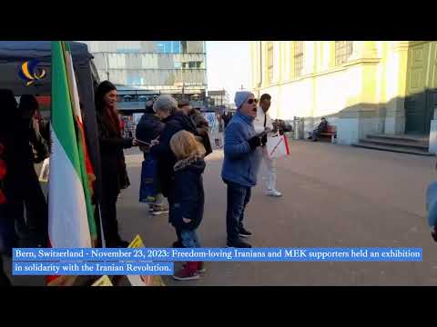 Bern, Switzerland—Nov 23, 2023: MEK supporters exhibition in solidarity with the Iranian Revolution