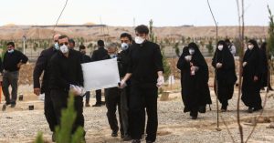 Iran, Qom - Burial of a coronavirus victim