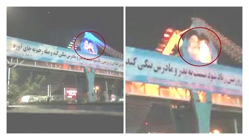 Tehran-–-Torching-large-posters-of-Khomeini-and-Khamenei-on-the-overpass-–-July-17-2020