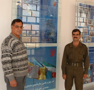 Ali Saremi (right) visiting his son Akbar Saremi (left) 