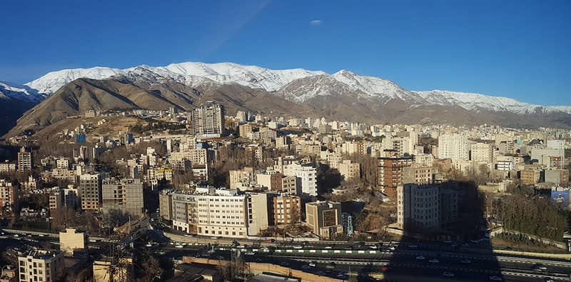 Evin neighborhood in the north of Tehran, the capital of Iran. Evin Prison is located in the Evin neighborhood of Tehran, Iran. The prison has been the primary site for the housing of Iran's political prisoners since 1972