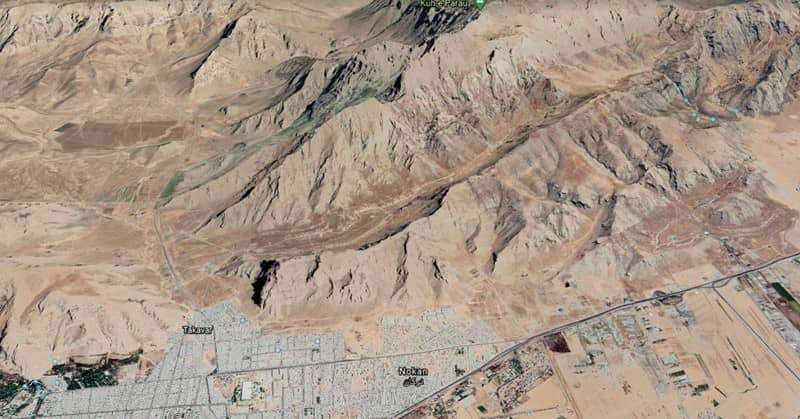 Diagonal satellite images show the missile launch facility, North East of Kermanshah, among the plateaus.