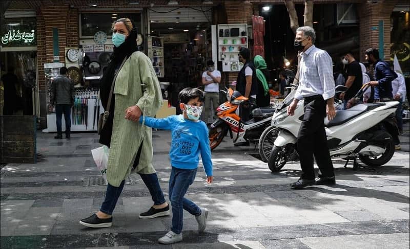 Iranian woman and her son in Tehran