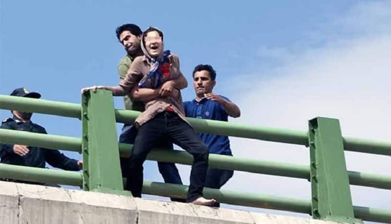 Suicide in Iran, woman jumping-bridge