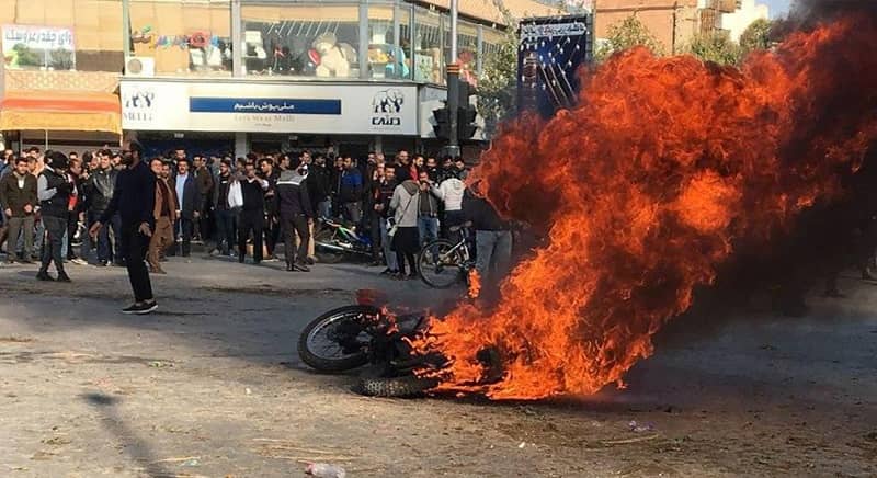 iran-protests-2019-motorbike-burned
