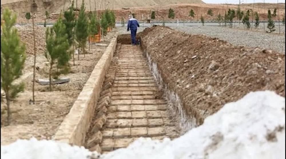 Preparing graves for covid victims in Iran [File photo]