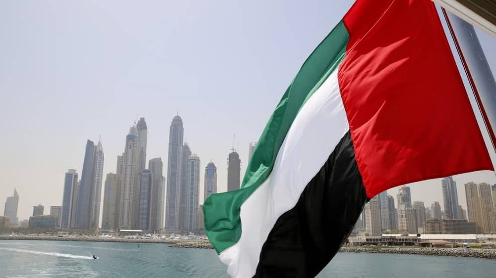 UAE flag flies over a boat