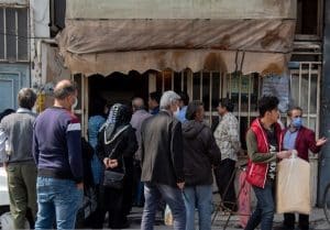 iran-people-queue-bakery