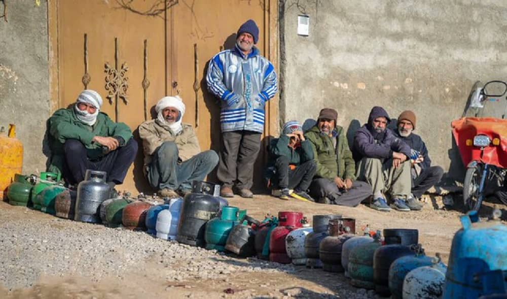 iran old men waiting gas shortage