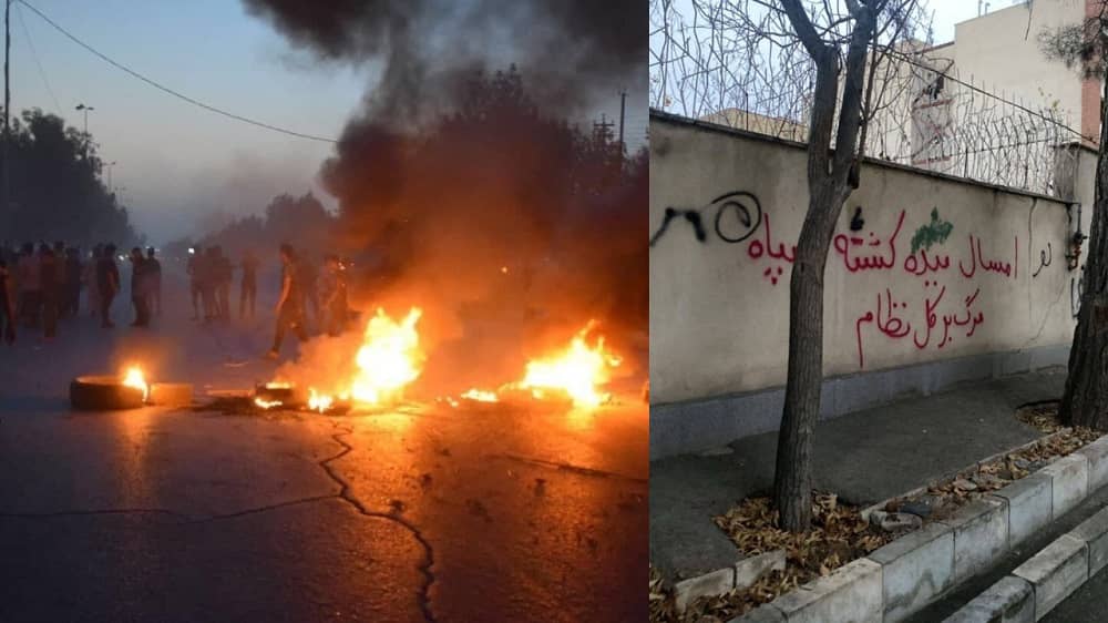 iran uprising street fire wall grafitti