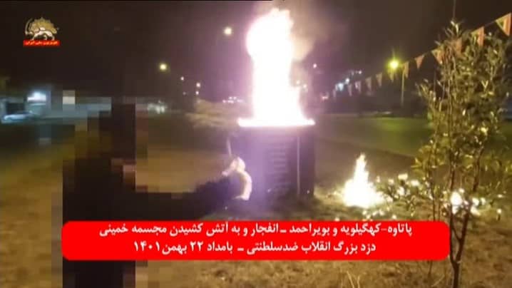 iran khomeini statue burned protester
