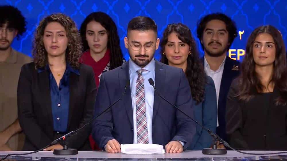 Hanif Mahoutchian at the Iranian Democratic Opposition NCRI's international conference on the one-year anniversary of the nationwide uprising; September 15, 2023