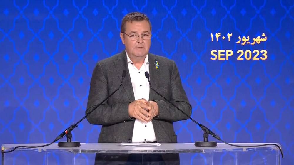 Mark Demesmaeker at the Iranian Democratic Opposition NCRI's international conference on the one-year anniversary of the nationwide uprising; September 15, 2023