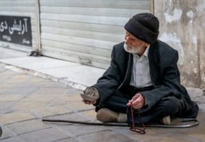 iran poverty old man begging