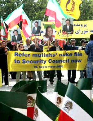 Supporters of the National Council of Resistance of Iran demand a referral of Iran's nuclear file to the U.N. Security Council in their rally in front of the U.N. building in Vienna where the International Atomic Energy Agency (IAEA) board of governors meeting takes place on the subject of Iranian nuclear. (September 19, 2005) 