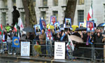 Supporters of the Iranian Resistance demonstrate in front of the Downing Streets