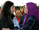 Maryam Rajavi greeting a young Iranian girl