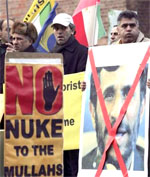 Members of the 'National Council of Resistance of Iran' protest against the Iran government and its nuclear program in front of the Foreign Ministry in Berlin on Thursday, Jan. 12, 2006.