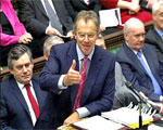 Britain's Prime Minister Tony Blair (C), flanked by Chancellor Gordon Brown (L) and Secretary of State for Defence John Reid (R), addressing Members of Parliament in the House of Commons, January 11, 2006.
