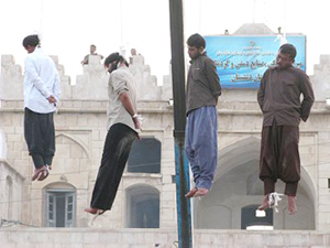 Iran: Four hanged in public