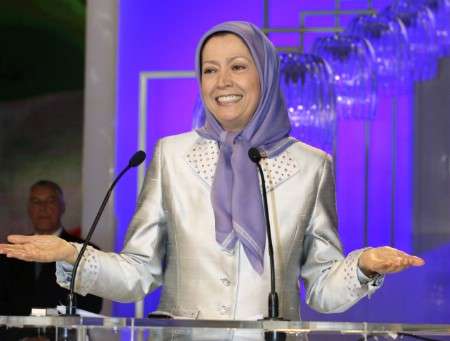 Maryam Rajavi, head of the National Council of Resistance of Iran, reacts as she is applauded by supporters of the People's Mujahideen Organisation of Iran (PMOI), who have gathered from around Europe at a rally in Villepinte near Paris June 28, 2008. Tens of thousands of people attended the rally to call on the European Union and the U.S. to remove the terror label against the PMOI. REUTERS/Handout (FRANCE).
