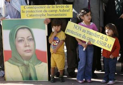 icture from Reuters - Children stand in front of protestors holding placards and a picture of Maryam Rajavi, leader of the Iranian resistance, Peoples Mojahedin Organization, during a demonstration in front of the United Nations headquarters in Geneva August 20, 2008. Placards read "Consequences of the withdrawal of Ashraf's camp Protection : Humanitarian disaster" and "No to transfer of Ashraf's Protection" 