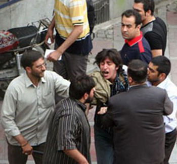 Photo: A young protestor moments before he was arrested and brutally murdered by the Iranian regime’s agents. Plainclothes agents wrestled him to the ground and slit his throat with a knife. Tehran, June 21, 2009