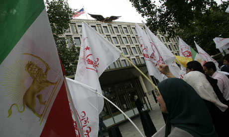Protesters shouts slogans outside the U.S. Embassy as they call on the U.S. government to take action to protect Iranians in Camp Ashraf, Iraq