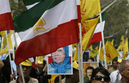 Iranians holding picture of Maryam Rajavi, President-elect of Iranian Resistance in a protest outside the United Nations in New York on September 23, 2009 , against Ahamdinejad.