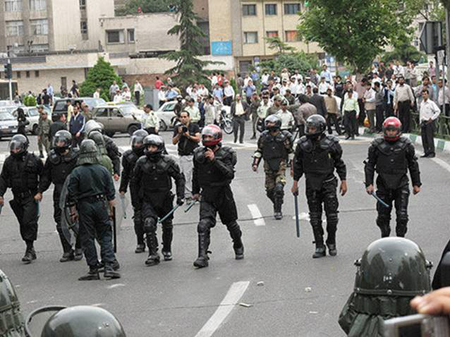 Mullahs' State Security Forces crackdown on protester in Iran, July 2009