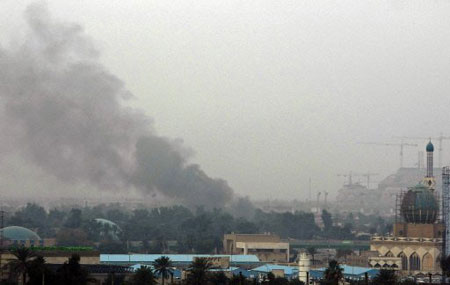 Dec. 15, 2009 -Smoke billows following an explosion in the Iraqi capital Baghdad