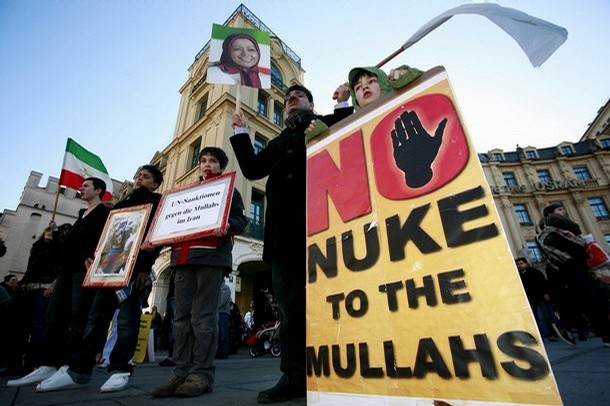 Iranian opposition members hold a sign which reads "No Nuke To The Mullahs" take past in a protest at the international security conference taking place on February 9, 2008 in Munich, southern Germany.