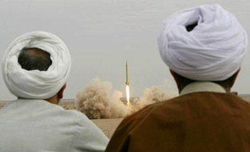   Iranian mullahs watch a test of a nuclear-capable Shahab-3  missiles, with a range of 2,000 km, outside Qom, Iran.