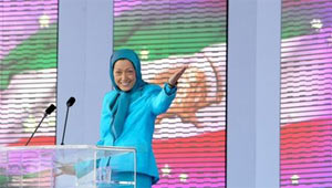 Iranians applaud Maryam Rajavi, National Council of Resistance of Iran at a rally in Taverny