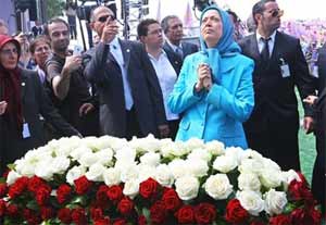 SampleIranians applaud Maryam Rajavi, National Council of Resistance of Iran at a rally in Taverny Image