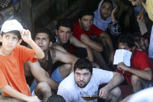 ranian asylum seekers who were caught in Indonesian waters while sailing to Australia  Read more: http://www.vcstar.com/news/2013/may/12/indonesia-detains-boat-carrying-96-asylum/#ixzz2bkVOJ8GY  - vcstar.com 