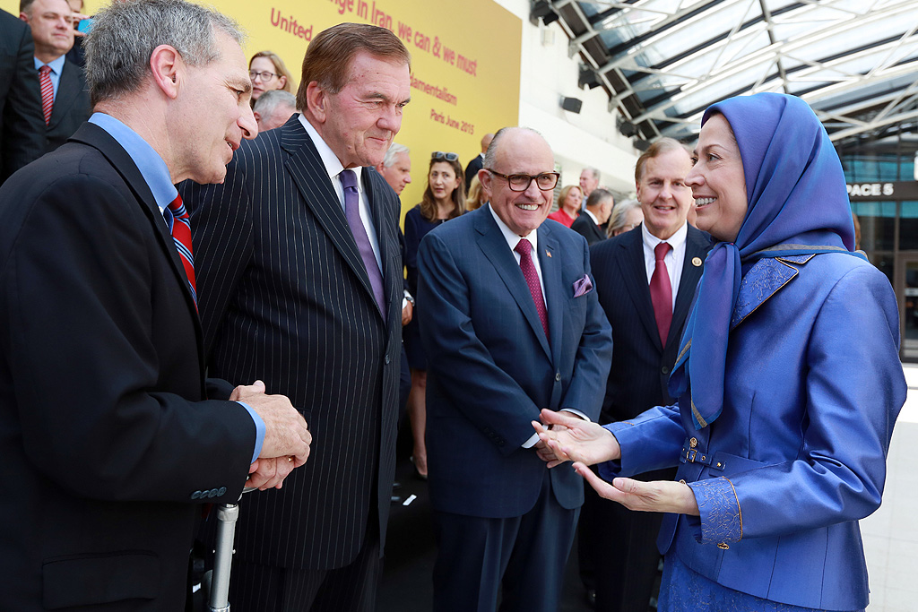  Maryam Rajavi greeting US dignitaries and lawmakers.