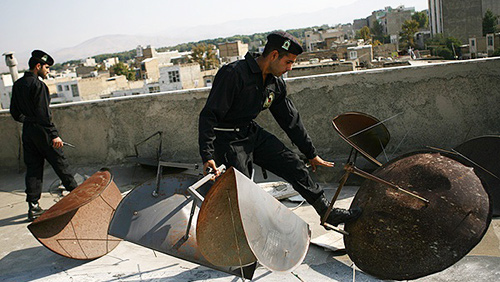 Iranian regime's security forces confiscate and destroy satellite dishes