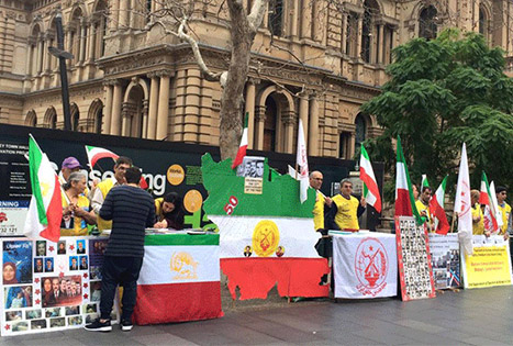 Supporters of the People's Mojahedin Organization of Iran (PMOI) rally in Sydney to condemn executions in Iran
