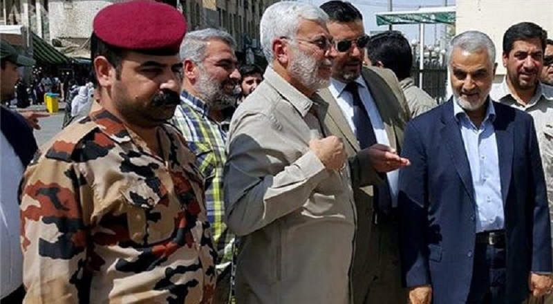 Qassem Soleimani standing with Abu Mahdi al-Muhandis, the commander of the terrorist Iraqi Hashd al-Shaabi